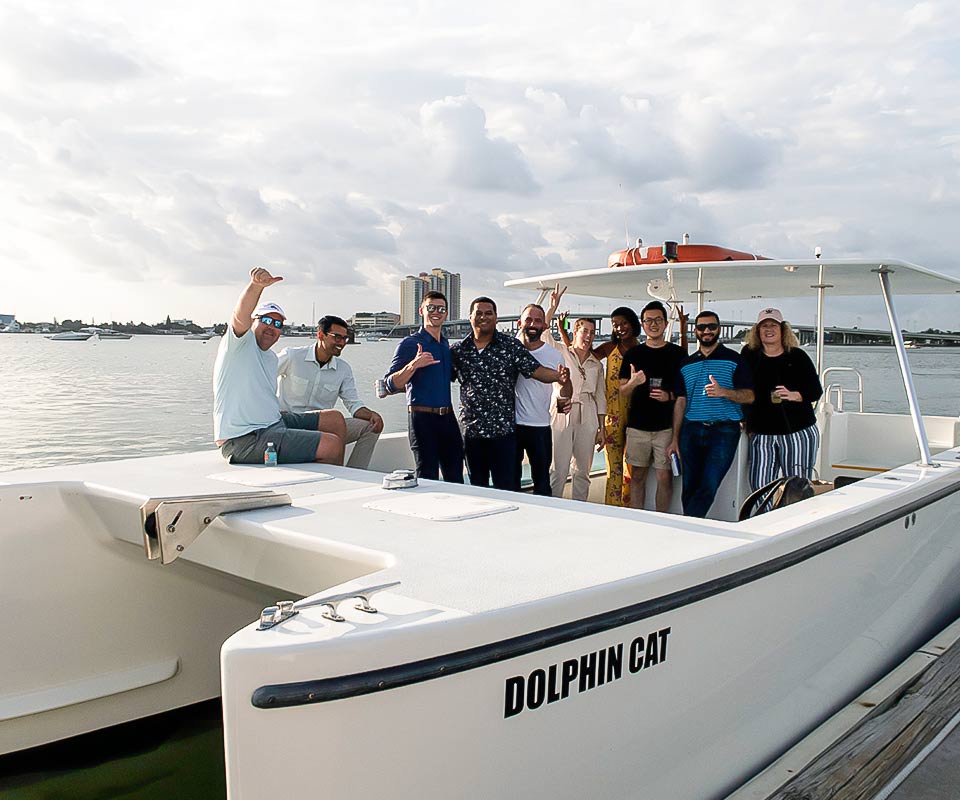 white boat rental dolphin cat with nine people.jpg